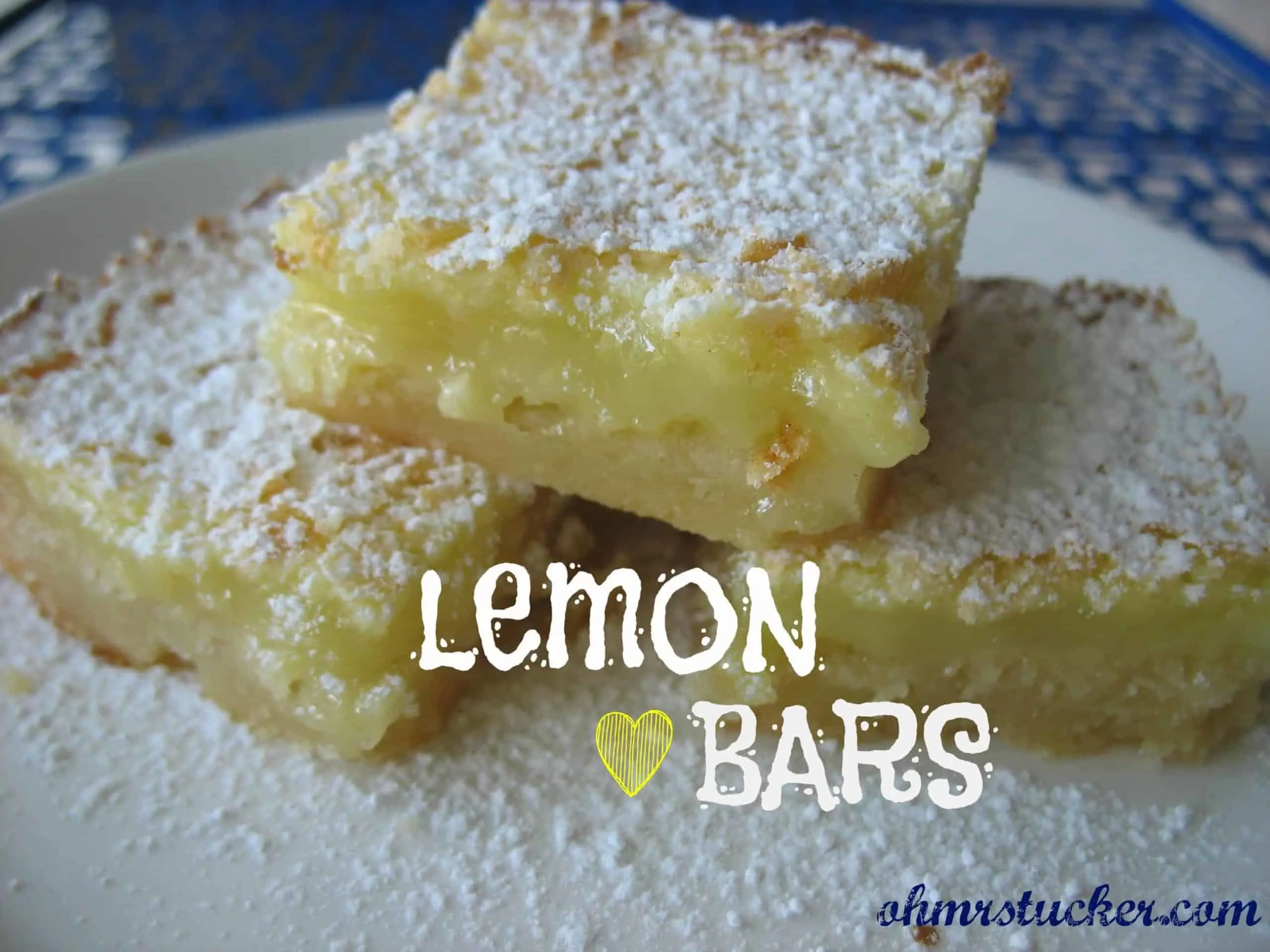 stacked cut leman bars dusted with powder sugar