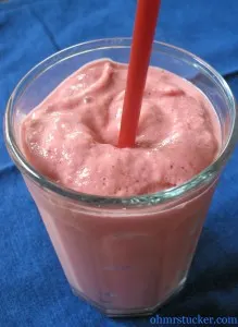 Strawberry Smoothie with a red straw