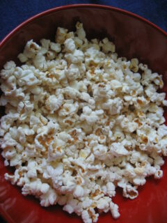popcorn in red bowl