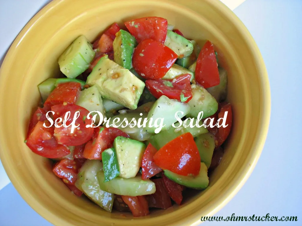 Self-Dressing Salad in a yellow bowl on blue background