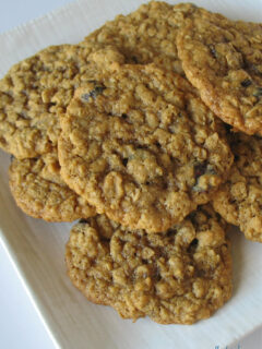 stack of Perfect Oatmeal Cookies on white plate