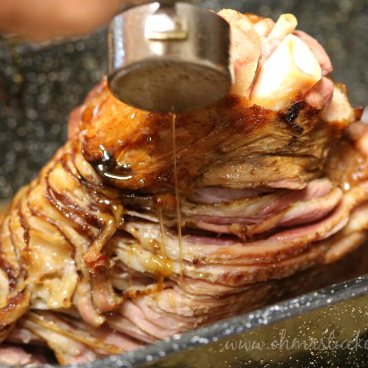 being poured over it in a panSpiral Ham with Pineapple Honey Glaze