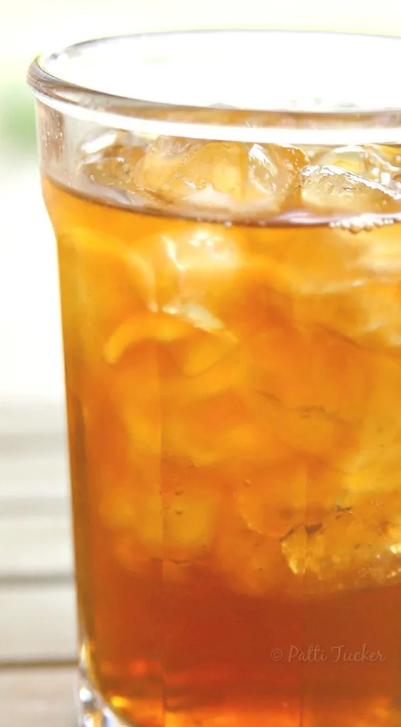 upclose of tea in a glass on a table