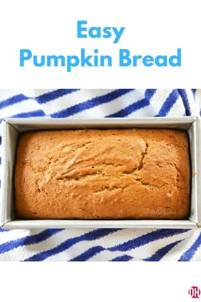 pumpkin bread in pan with text