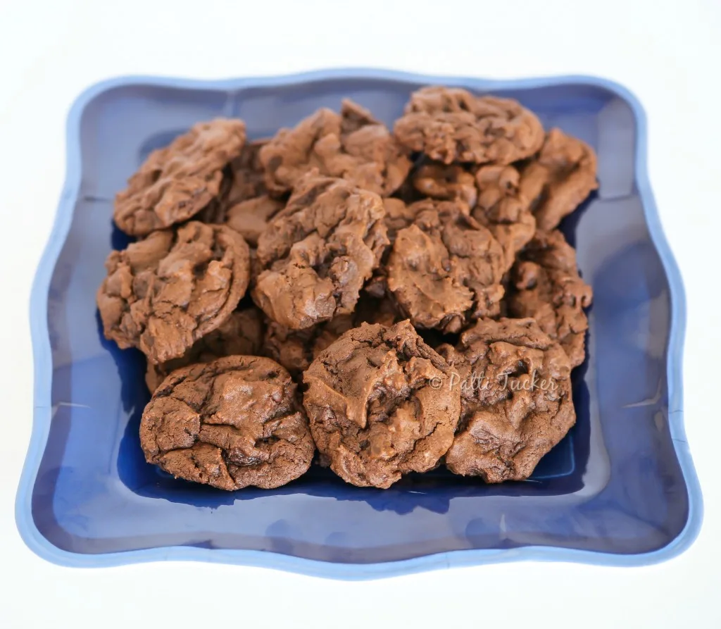 Chocolate Bomb Buttermilk Cookies on a blue plate