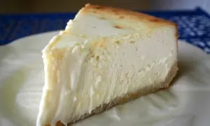 a closeup of a slice of cheesecake on a plate