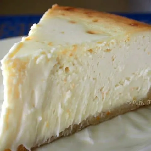 a closeup of a slice of cheesecake on a plate