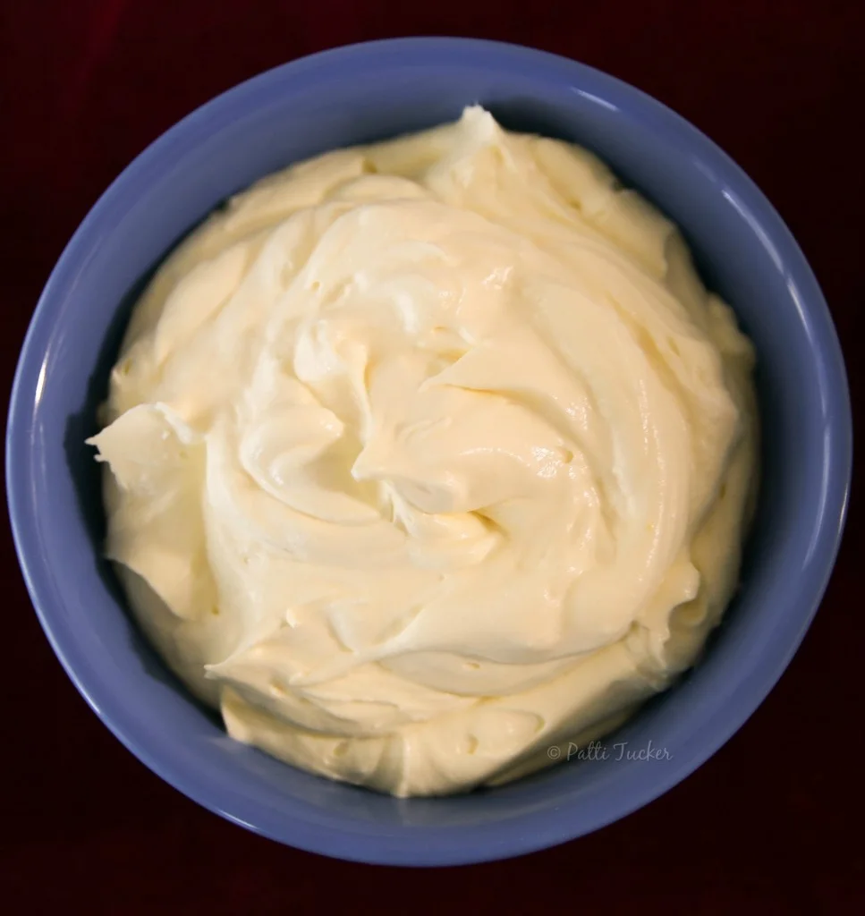 cake filling in a blue bowl