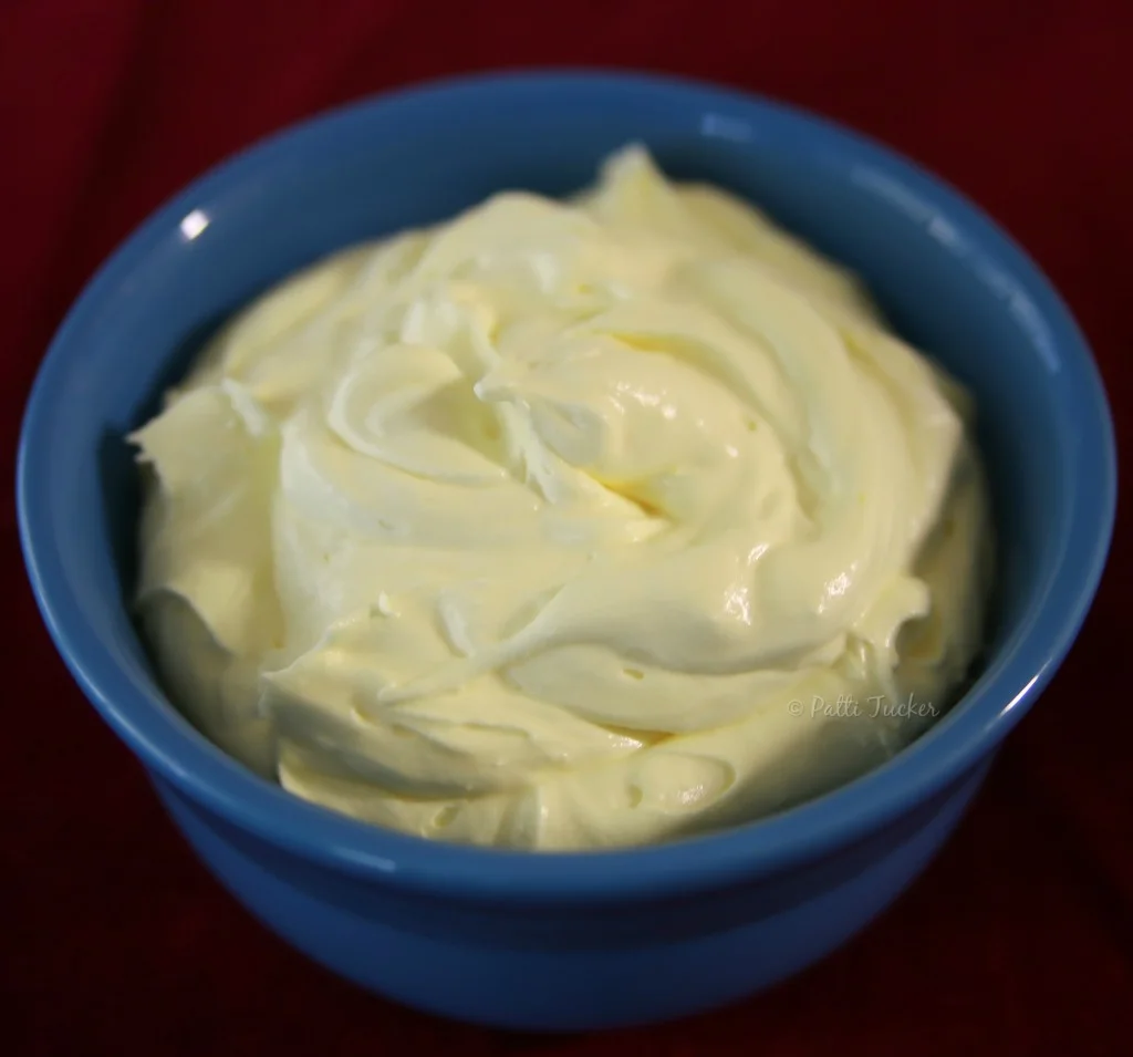 cake filling in a blue bowl