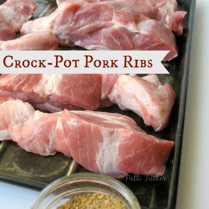 Raw Easy Crock Pot Country Style Pork Shoulder Ribs on a pan