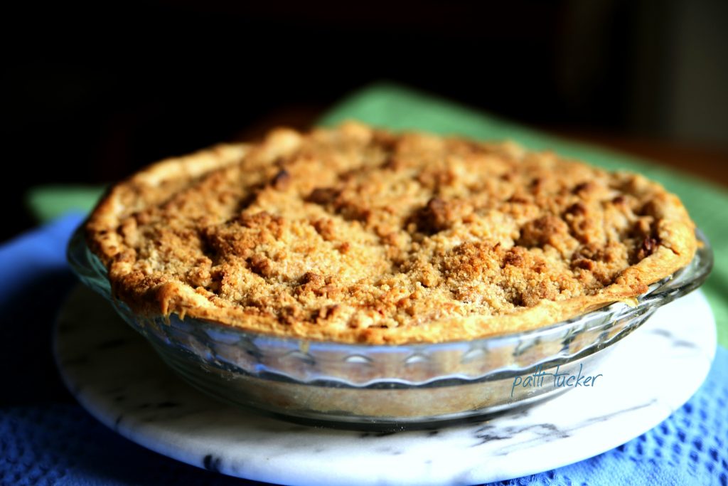 a Streusel-Topped Apple Pie on a platter