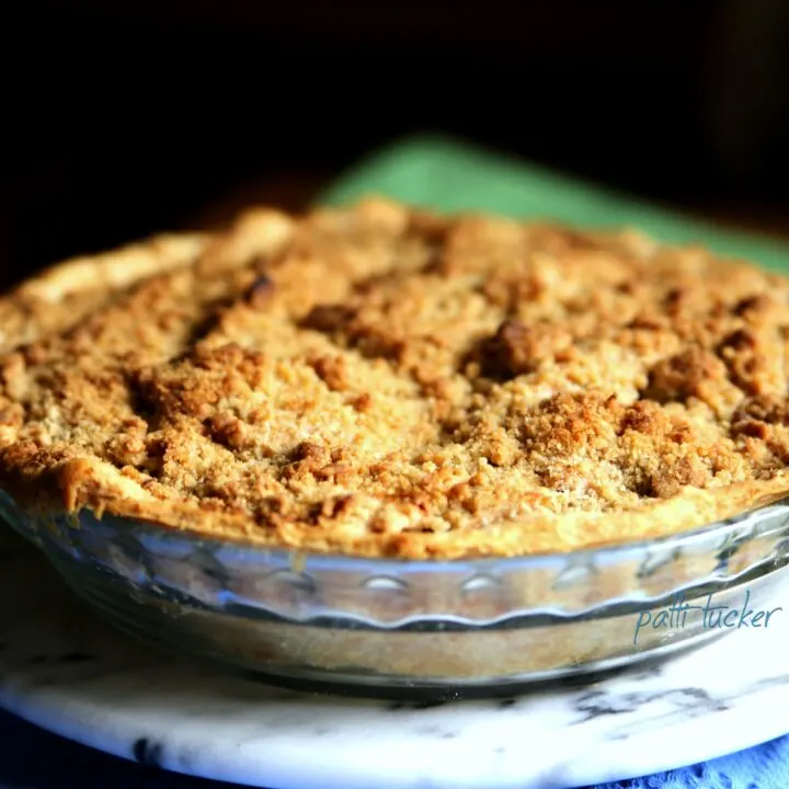 a Streusel-Topped Apple Pie on a platter