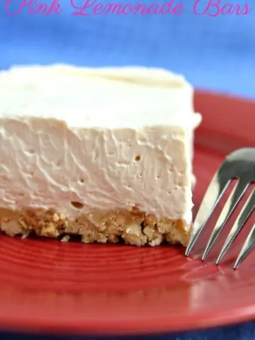 Slice of a Pink Lemonade Bar bar on a red plate