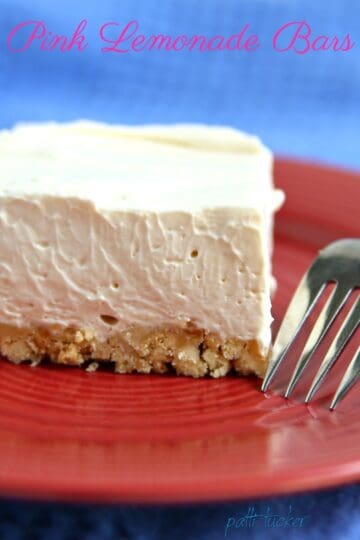 Slice of a Pink Lemonade Bar bar on a red plate