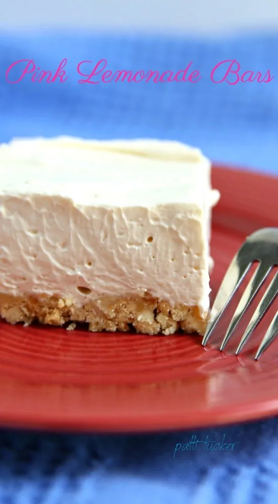 Slice of a Pink Lemonade Bar bar on a red plate