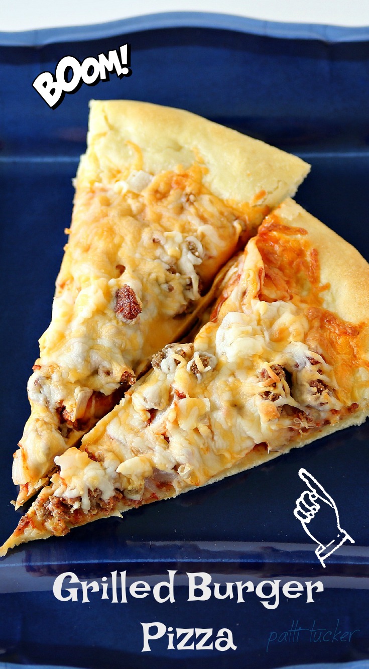 two slices of cheeseburger pizza on a blue plate