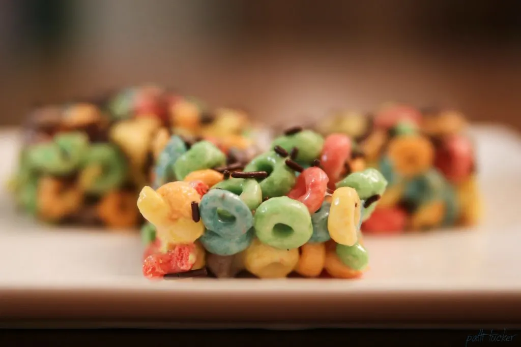 fruit loops marshmallow treats on a platter