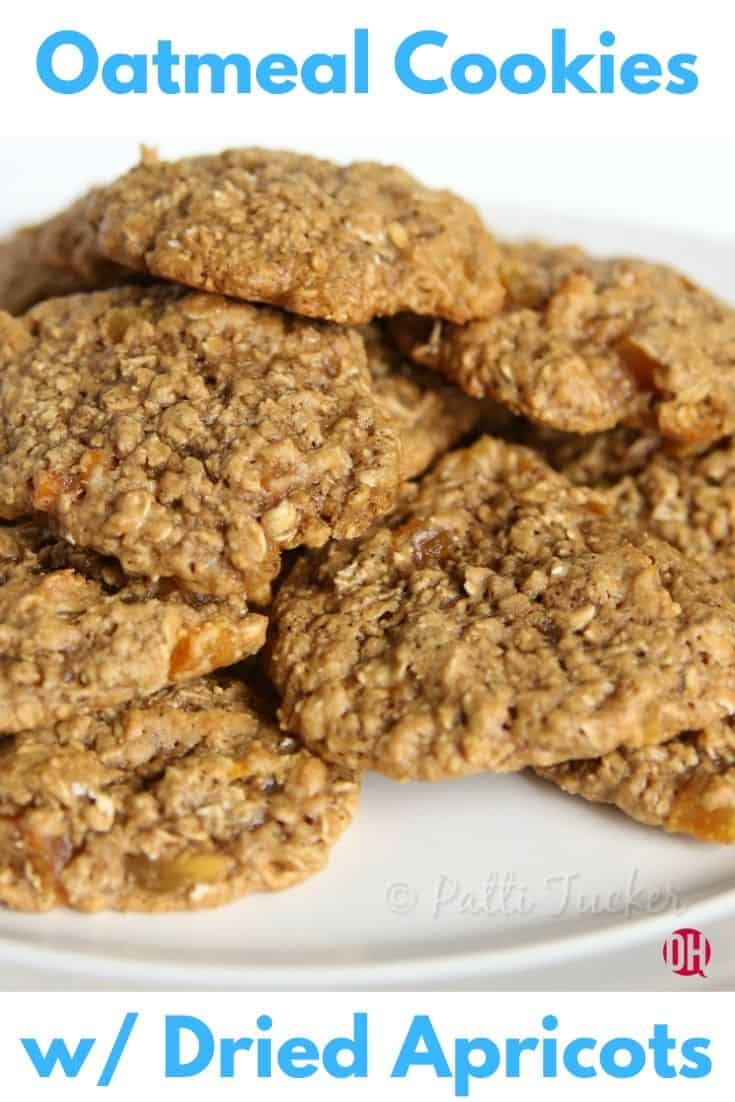 oatmeal cookies stacked on a white plate