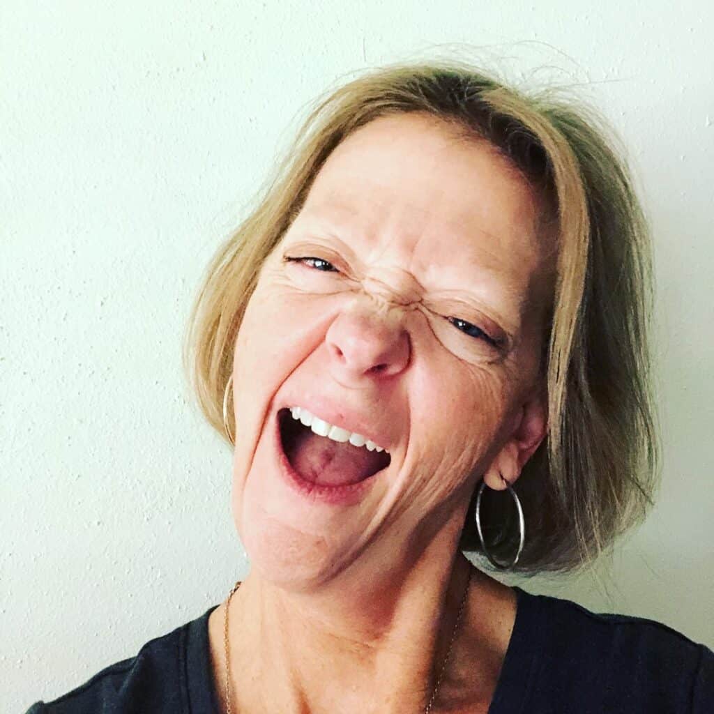Woamn making a fun face