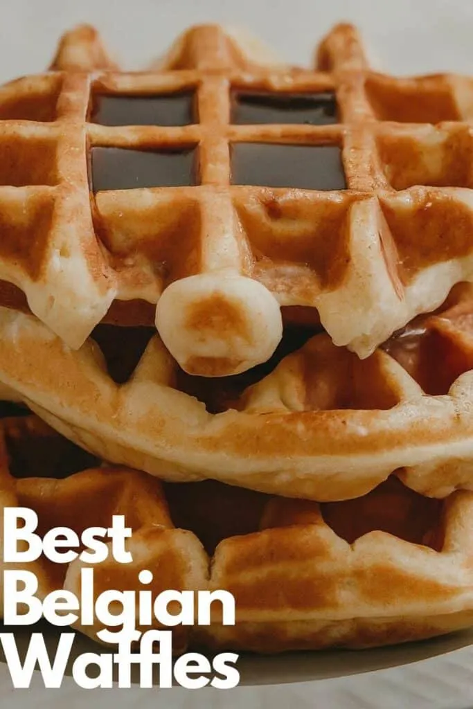 Upclose of Belgian Waffles on a plate with text overlay that says best belgian waffles