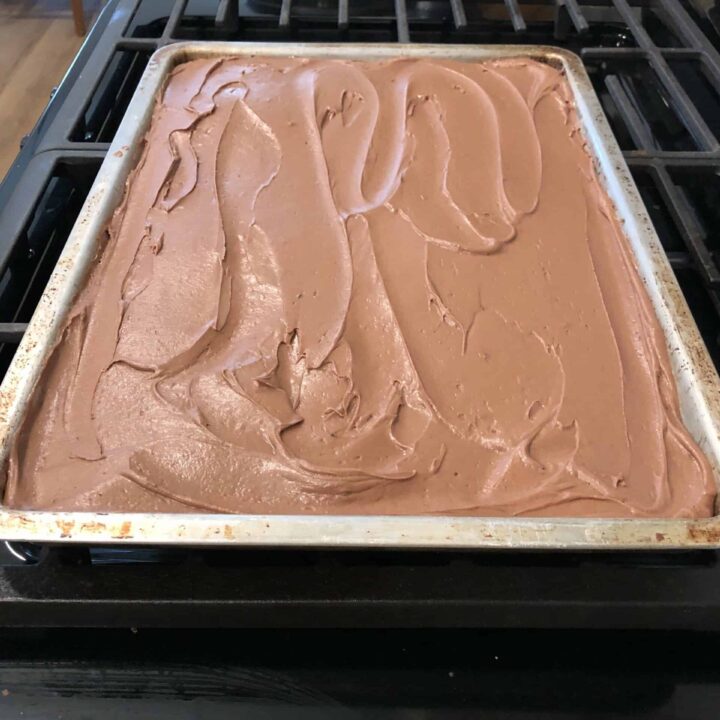 sheet cake with chocolate frosting in a pan