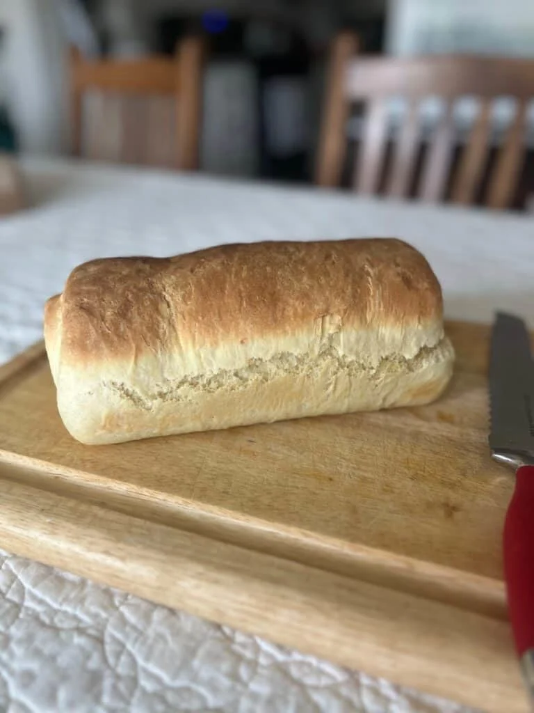 Loaf of homemade bread on a cutting board